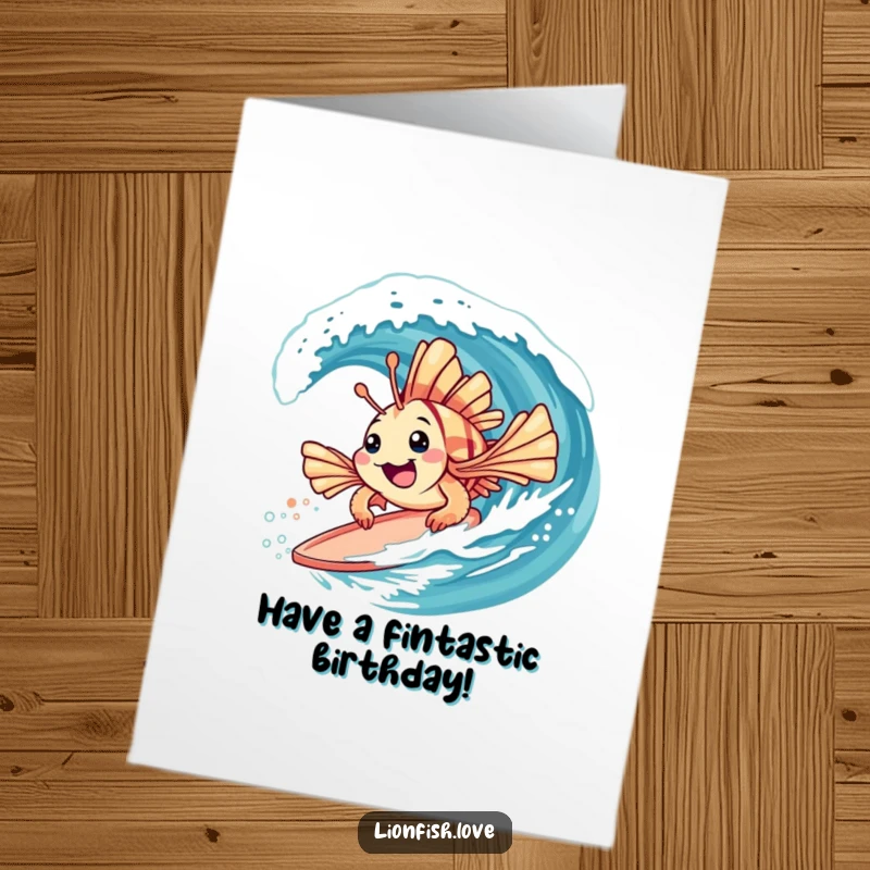Funny Free Printable Birthday Card with a playful lionfish with spiky fins happily surfing on a gentle wave, full of ocean vibes.