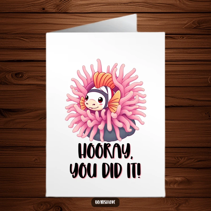 Funny Free Printable Congratulations Card: Shy lionfish peeking from an anemone, sending congrats. A cute downloadable greeting.