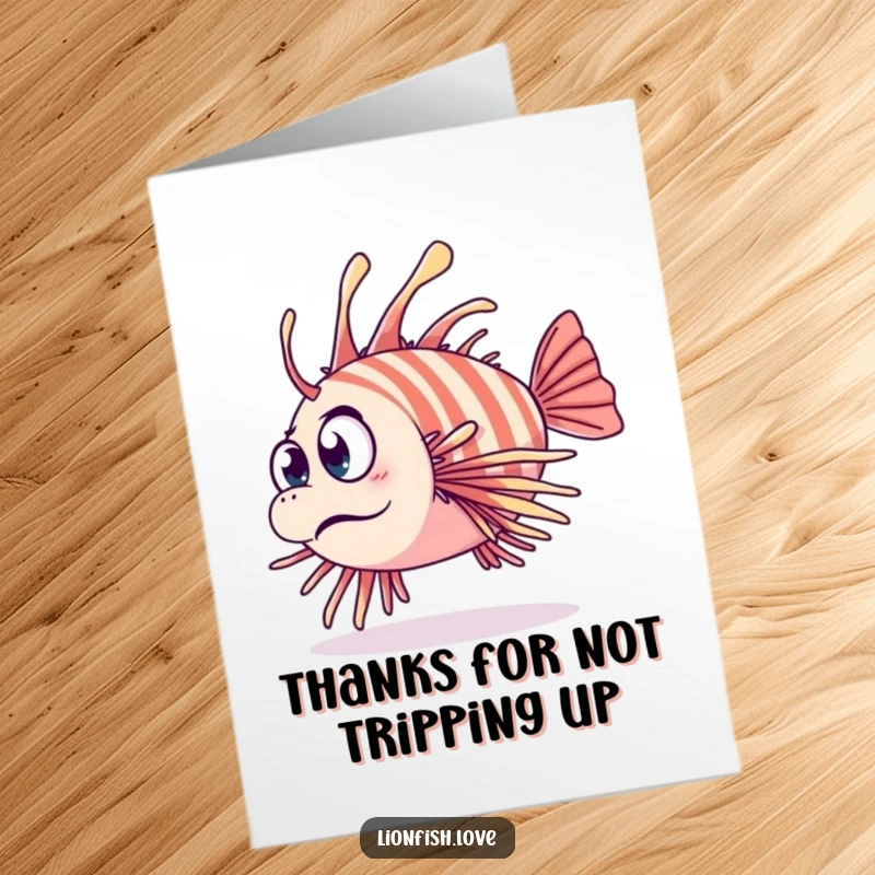 Funny Free Printable Thank You Card with a clumsy lionfish tripping over its fins, looking surprised while trying to say thanks.